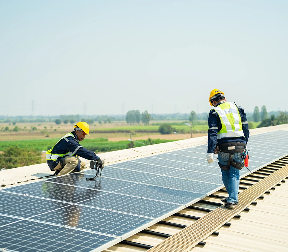 Two-men-maintaining-solar-panels