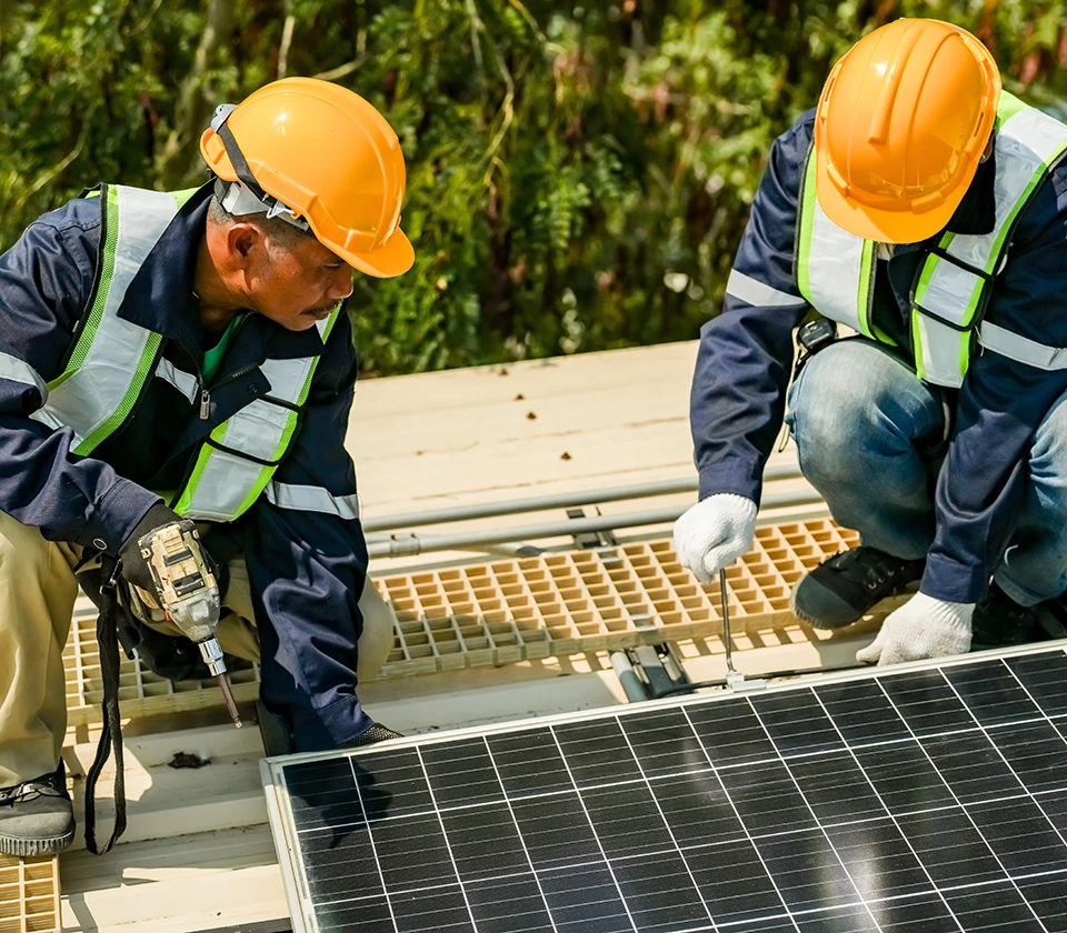two-man-settingup-solar-panels
