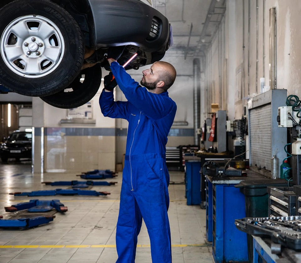 Mechanic fixing car