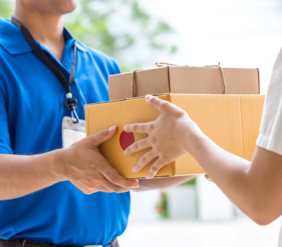 delivery-man-giving-the-boxes-to-the-customer